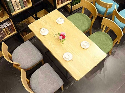 主题休闲小吃店实木餐厅桌椅
